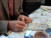 Miniaturmaler Prof Toghi bei der Arbeit