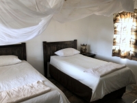 Hotel Dqau Qare San Lodge Zimmer