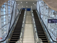 Rolltreppe-zur-Metro-hinauf