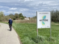 Foto während der E-Bike Fahrt Unesco-Weltkulturerbetafel
